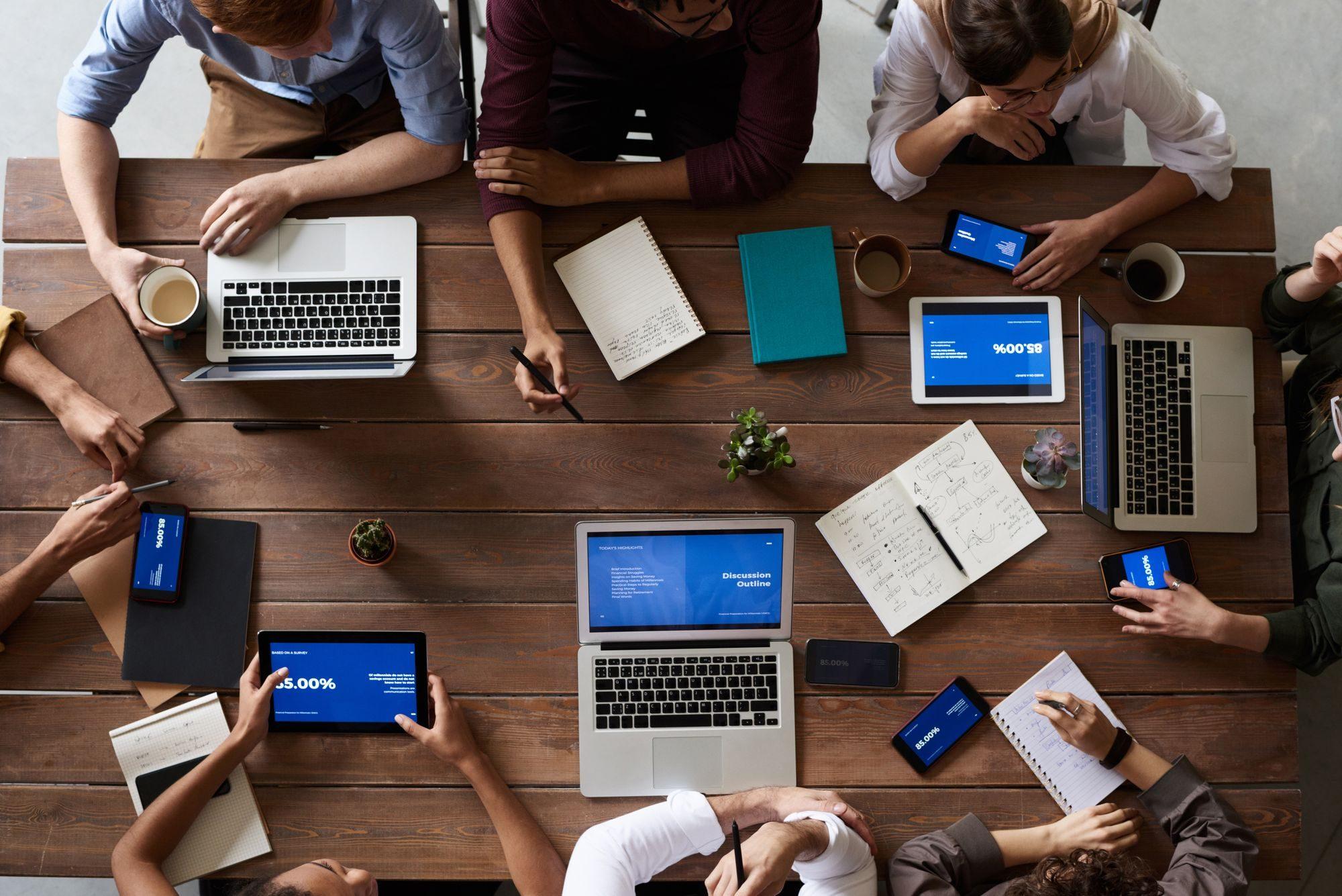 Business professionals collaborating around a table
